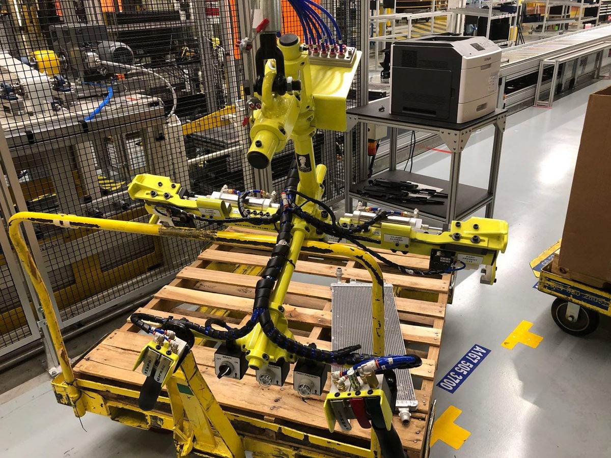 An EFS vacuum gripper tool with pneumatic actuators for precision component handling